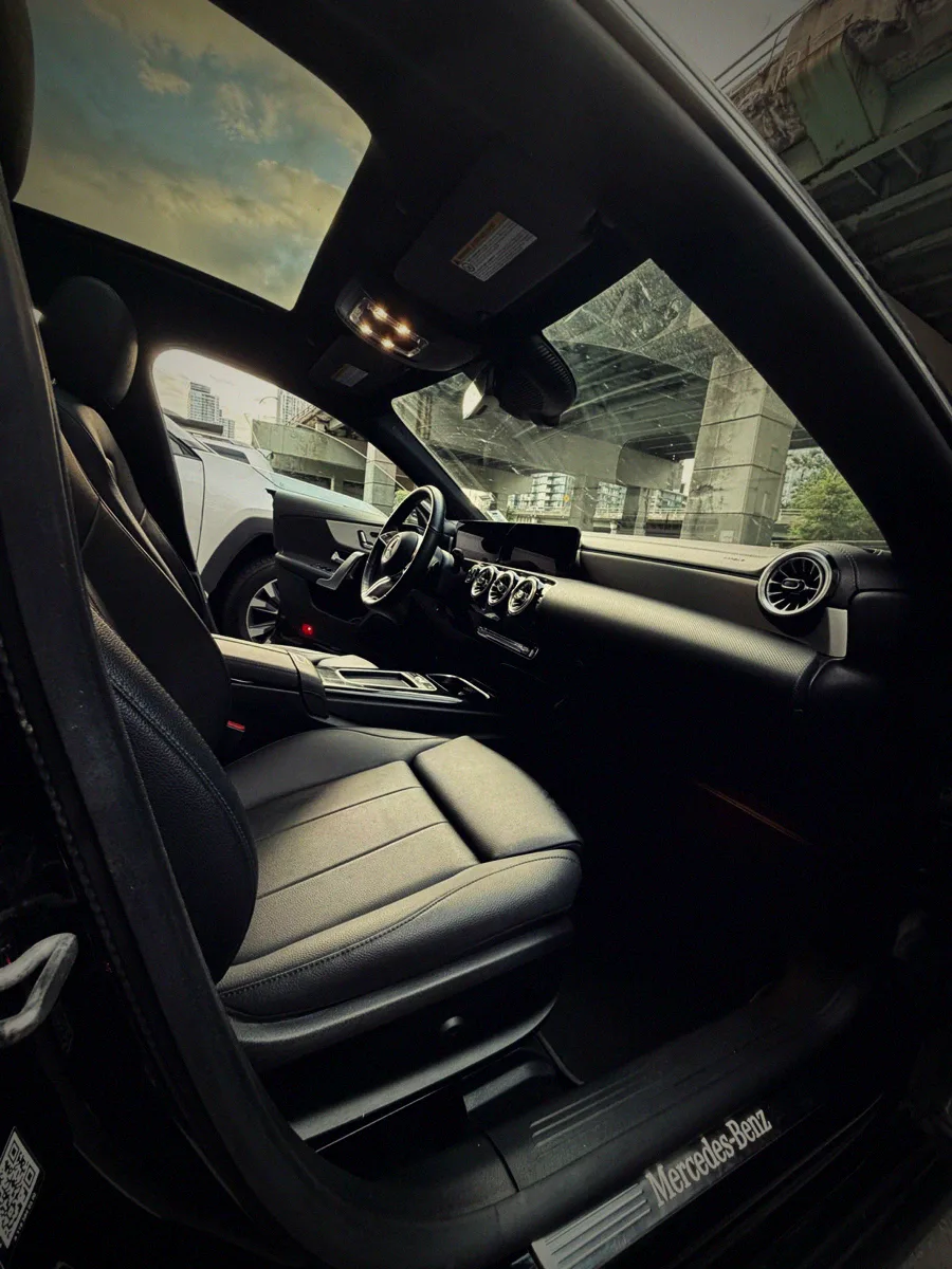 The driver’s side through the open door