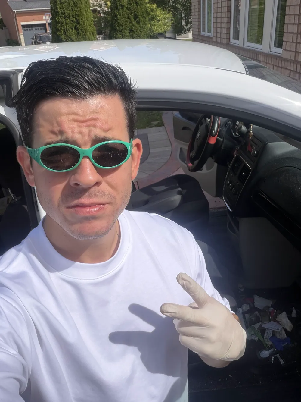 The owner of Step By Step Auto after a detail